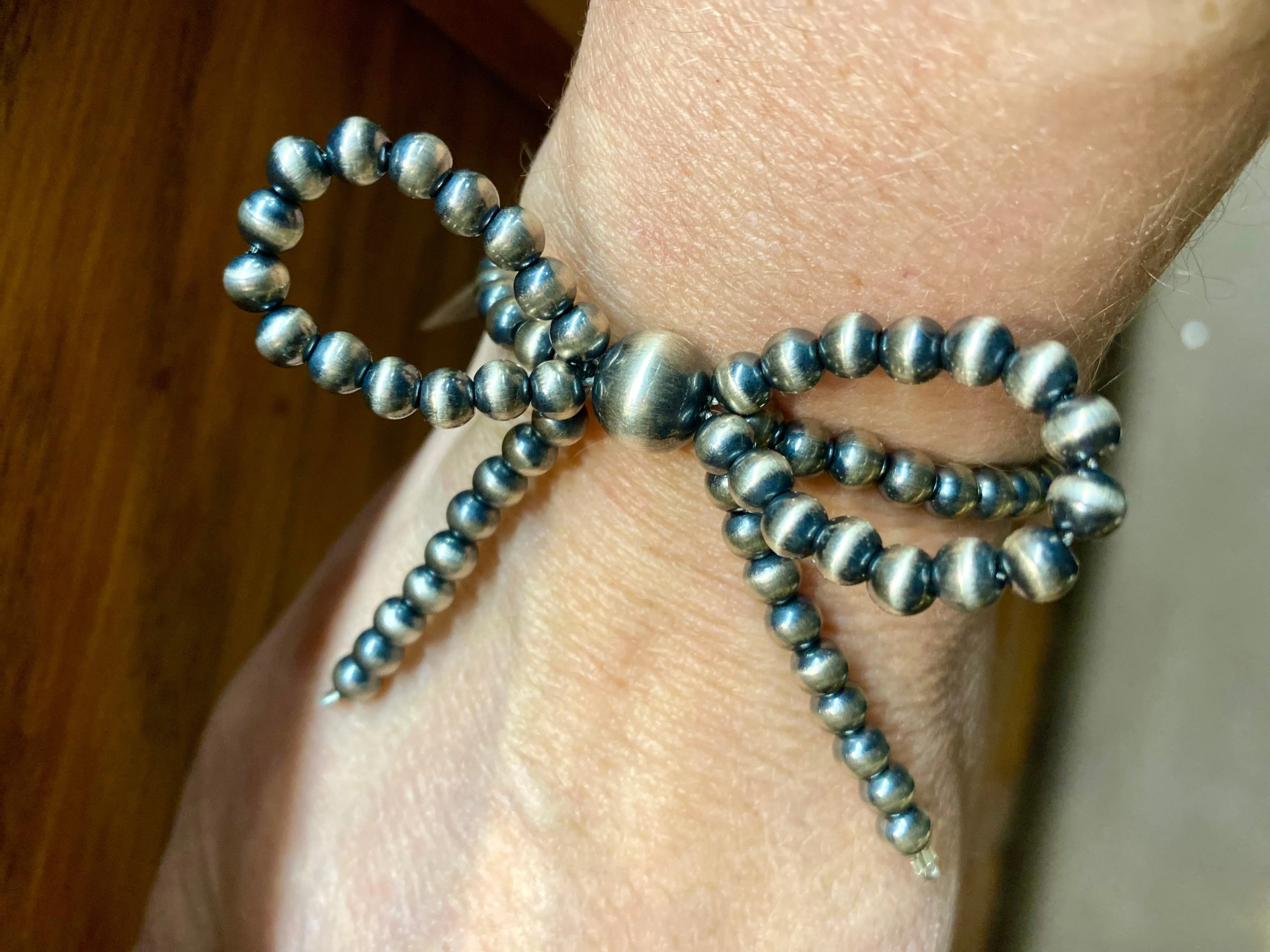 Delta Sterling Navajo Bow Bracelet
