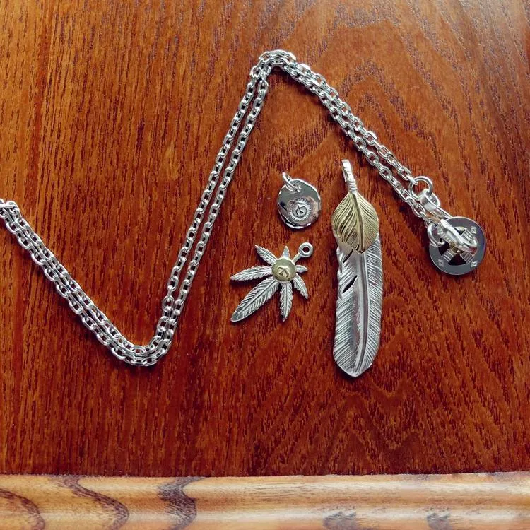 Goros Gold Top Feather, Grass With 18K Gold, And Silver In Sun Metal Setup